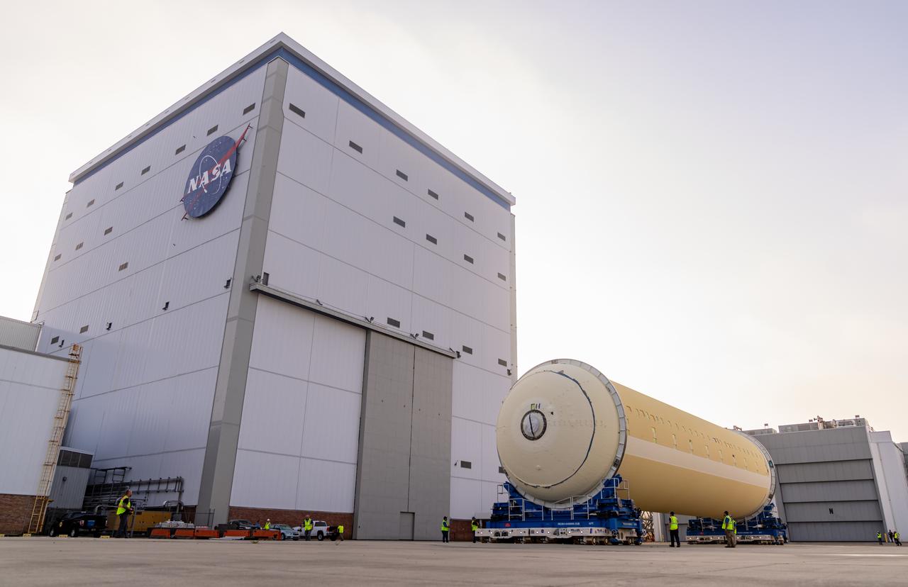 Teams at NASA’s Michoud Assembly Facility in New Orleans move a liquid hydrogen tank for the agency’s SLS (Space Launch System) rocket into the factory’s final assembly area on April 22. Having recently completed application of the thermal protection system, teams will now continue outfitting the 130-foot-tall tank with critical systems to ready it for its designated Artemis III mission. The propellant tank is one of five major elements that make up the 212-foot-tall rocket stage. The core stage, along with its four RS-25 engines, produce more than two million pounds of thrust to help launch NASA’s Orion spacecraft, astronauts, and supplies beyond Earth’s orbit and to the lunar surface for Artemis.